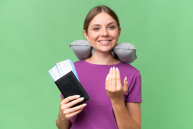 Young blonde woman over isolated background