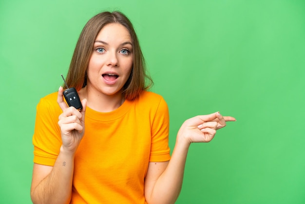 Young blonde woman over isolated background