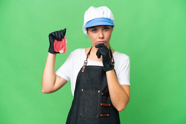 Young blonde woman over isolated background