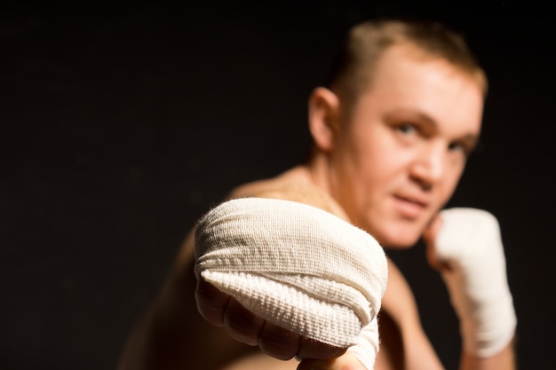 Young boxer throwing a powerful punch