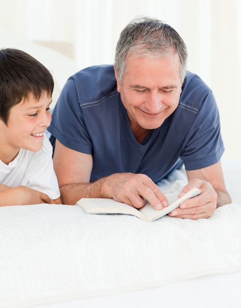 Young boy listening his grandfather