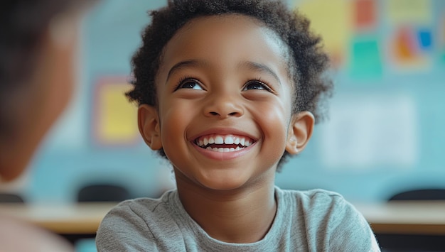 A young boy with a big smile on his face