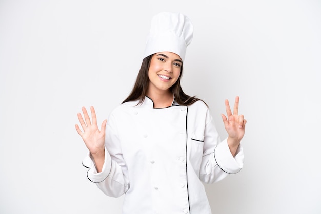 Young Brazilian chef woman isolated on white background counting eight with fingers