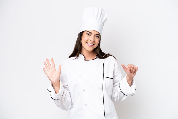 Young Brazilian chef woman isolated on white background counting six with fingers