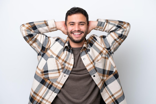 Young Brazilian man isolated on white background laughing