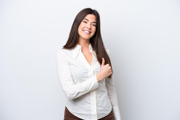 Young Brazilian woman isolated on white background giving a thumbs up gesture