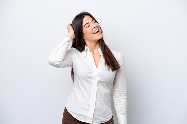 Young Brazilian woman isolated on white background smiling a lot