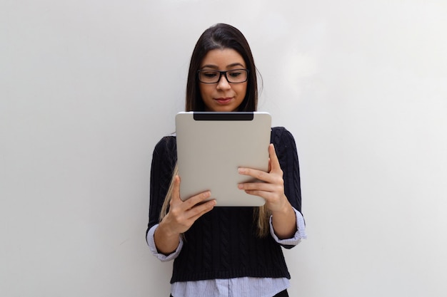 Young brunette Business woman isolated on white background Woman with laptop or tablet