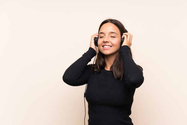 Young brunette girl listening music