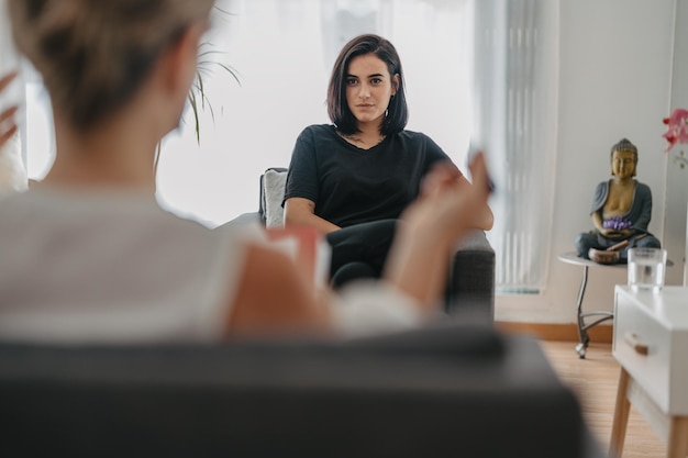 Young brunette girl in a psychology session