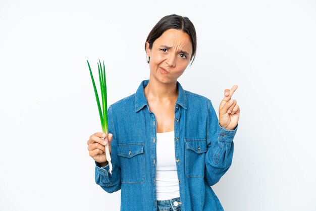 Young brunette hispanic woman on isolated background