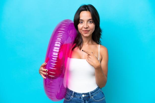 Young brunette hispanic woman on isolated background