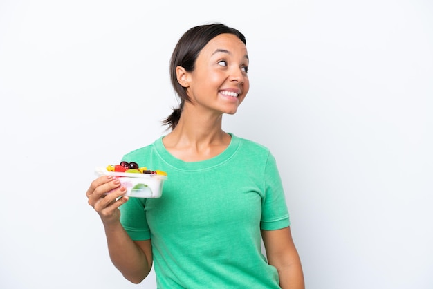 Young brunette hispanic woman on isolated background