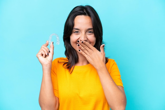 Young brunette hispanic woman on isolated background