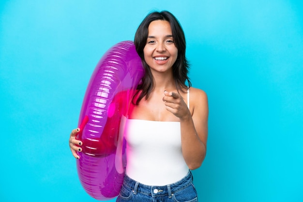 Young brunette hispanic woman on isolated background