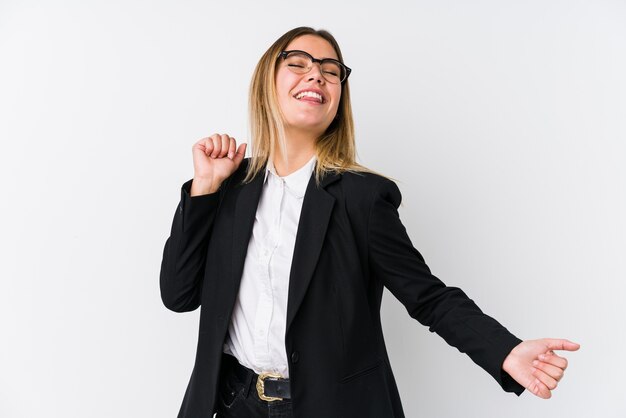 Photo young business caucasian woman dancing and having fun