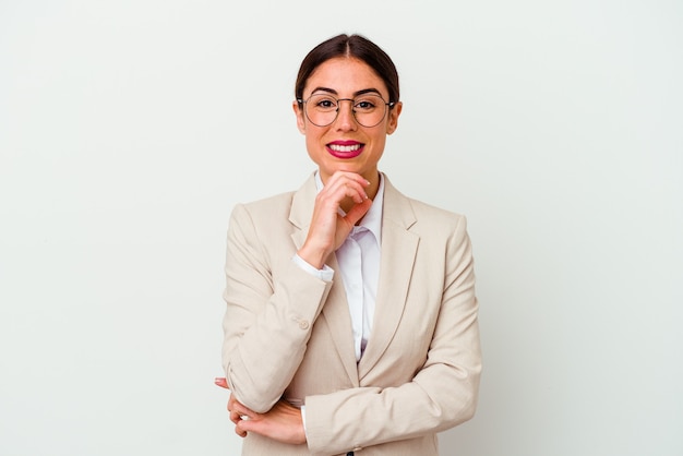 Young business caucasian woman isolated on white background smiling happy and confident, touching chin with hand.