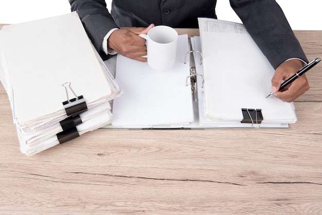 Photo young business man cents at office desk.