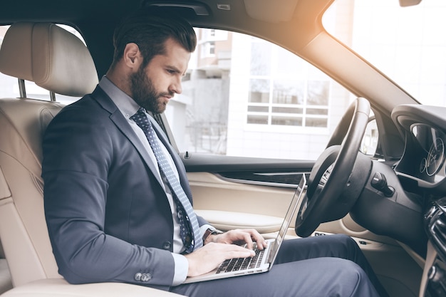 Young business man test drive new car