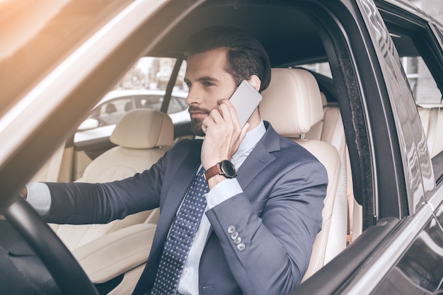 Young business man test drive new car