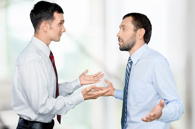 Young business men working together in office