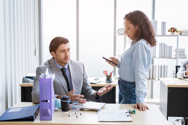 A young business people discussing and brainstorming at modern office