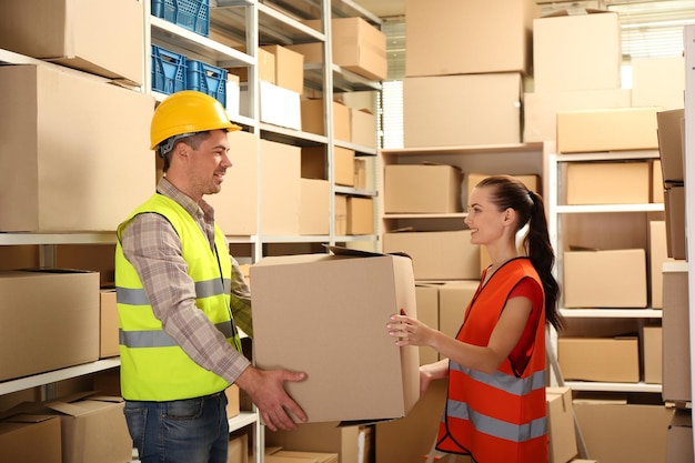 Young business people working at warehouse