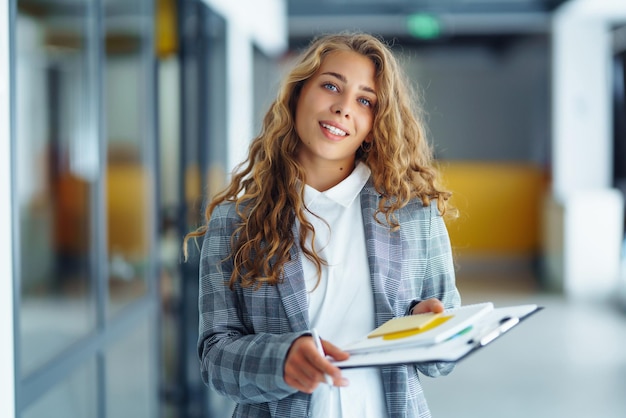 Young business woman an office building hallway Female Entrepreneur People business freelance