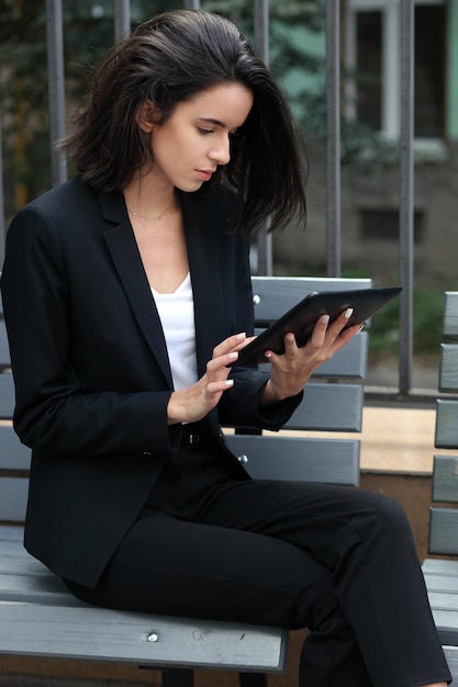 Young business woman using a digital tablet computer