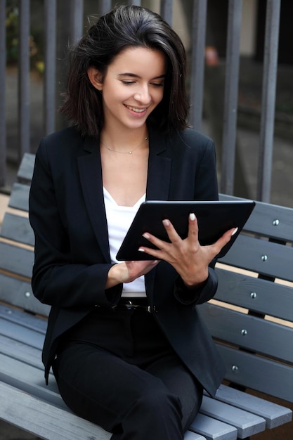 Young business woman using a digital tablet computer