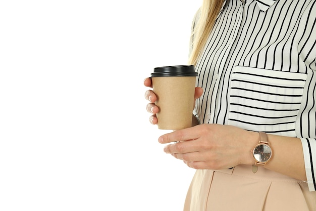 Young business woman with coffee isolated on white background