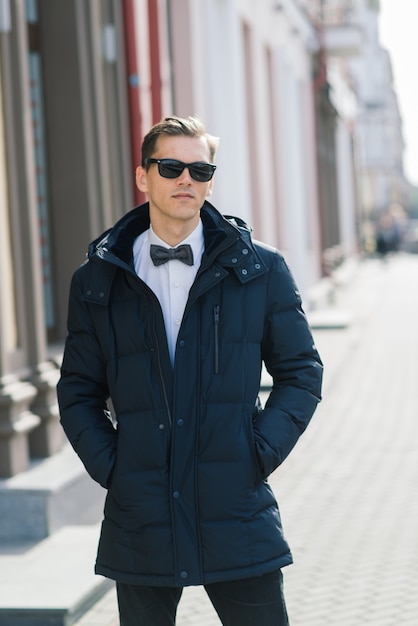 Young businessman in formal clothes and jacket