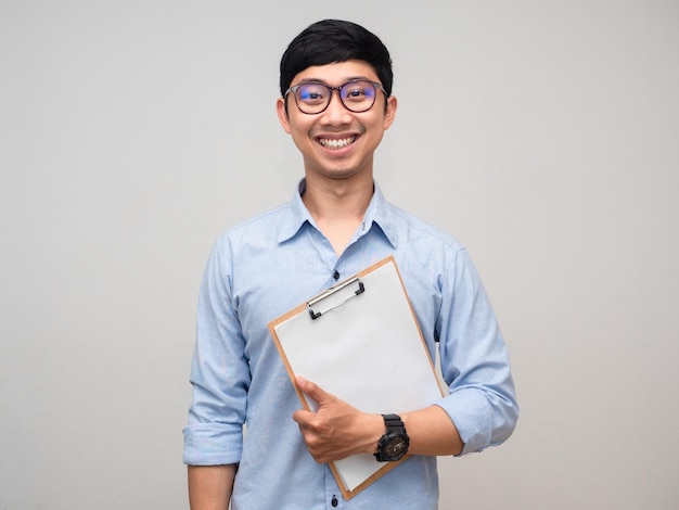 Young businessman hold document board smile face portrait