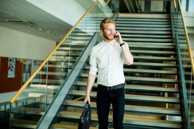 Young businessman on the stairs