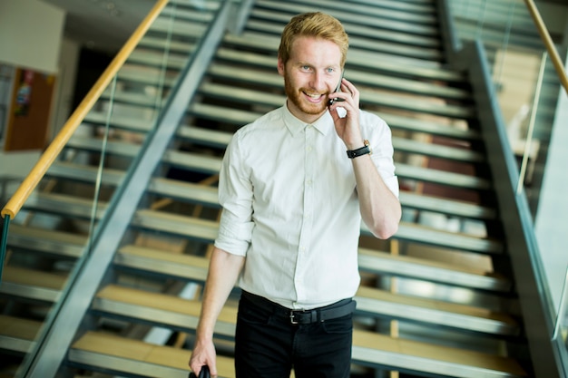 Young businessman on the stairs