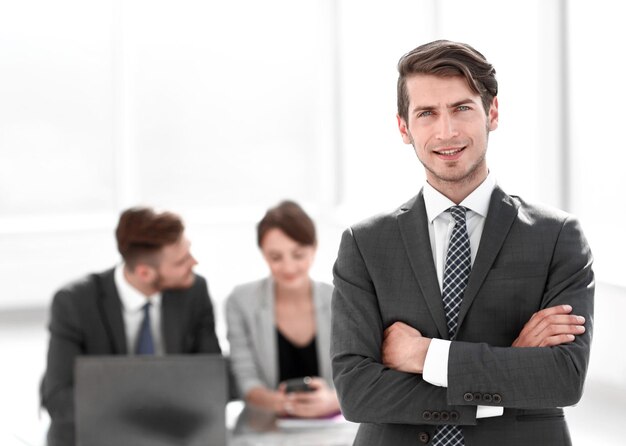 Young businessman standing in the office