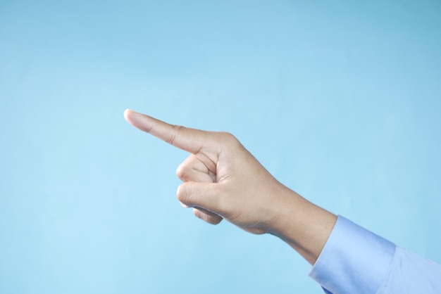 Young businessman in suit point finger