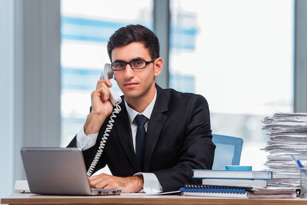 Young businessman talking on the phone