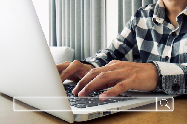 Young businessman use their tying keyboard on laptop