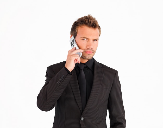 Young businessman using a cell phone 