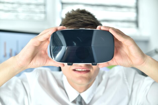 Young Businessman Wearing Virtual Reality Googles