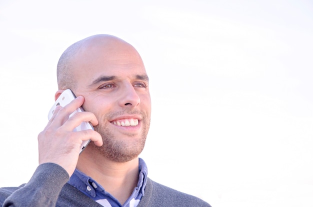 Young businessman with mobile phone