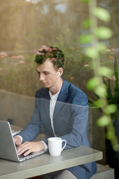 Young Businessman Working on Laptop