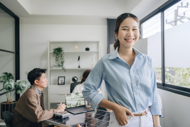 Young businesswoman confidently smiling for her successful project