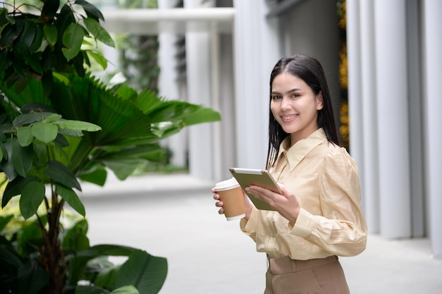 A young businesswoman is working in modern city downtown of Singapore