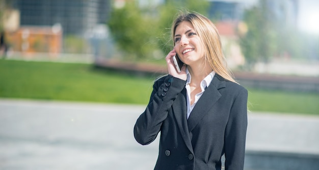 Young businesswoman talking on the cellphone