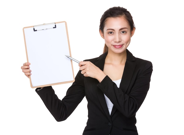 Young Businesswoman with pen point to clipboard