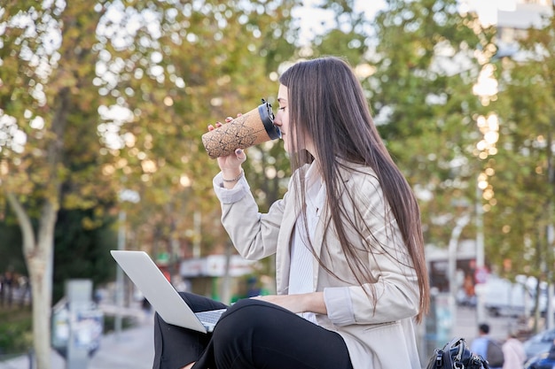 Young businesswoman working with her laptop