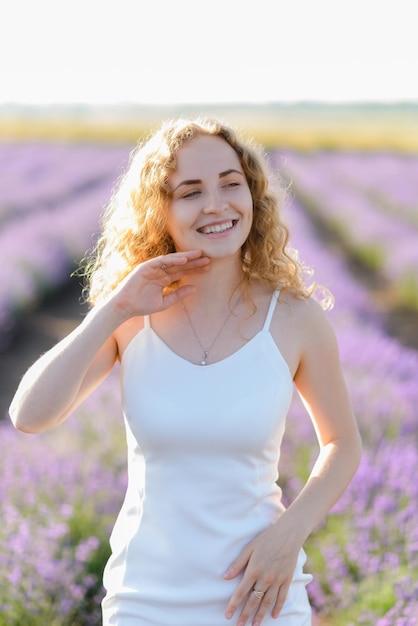 Young caucasian beautiful woman in a lavender field