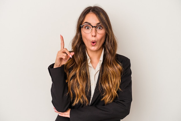 Young caucasian business woman isolated on white background having some great idea, concept of creativity.